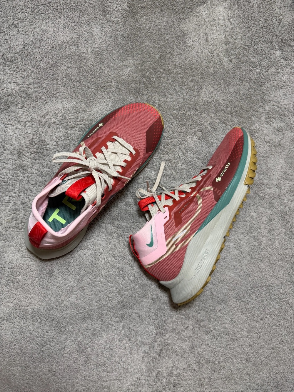 Nike Women’s Pegasus Trail 3
Pink, red, and teal with a white Nike swoosh